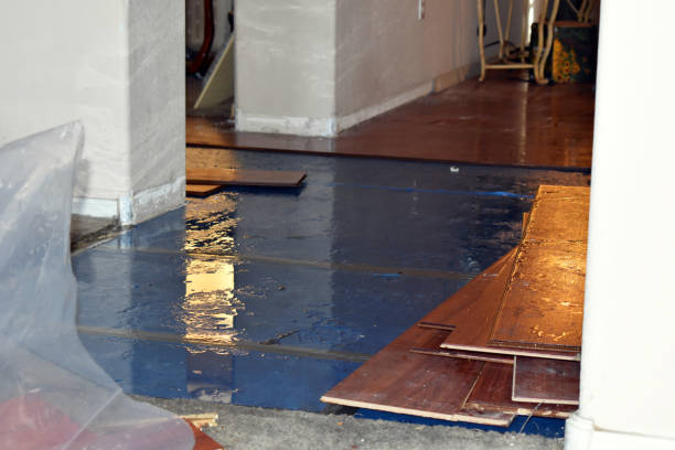 Professional Sewage Cleanup technician working in Armonk, NY